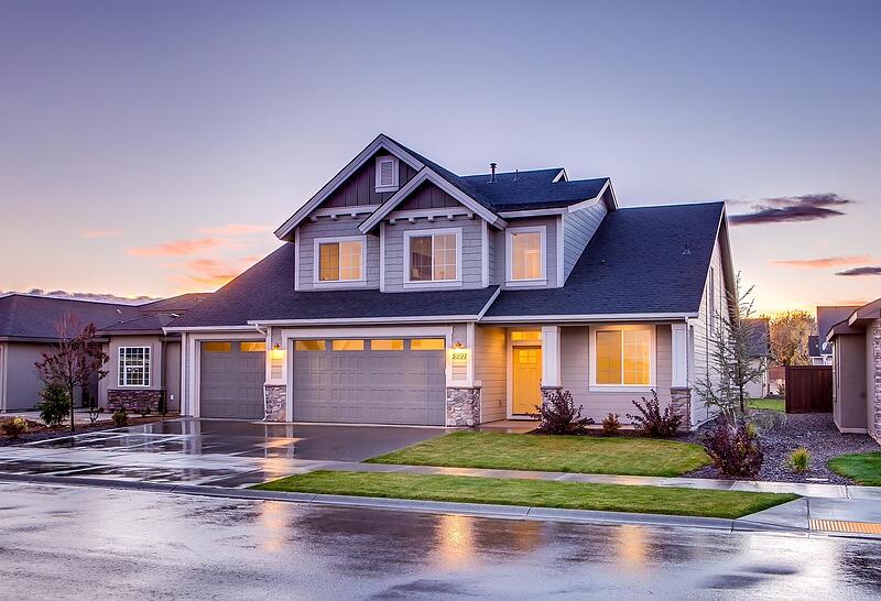 A single-story house with an attached garage and a driveway
